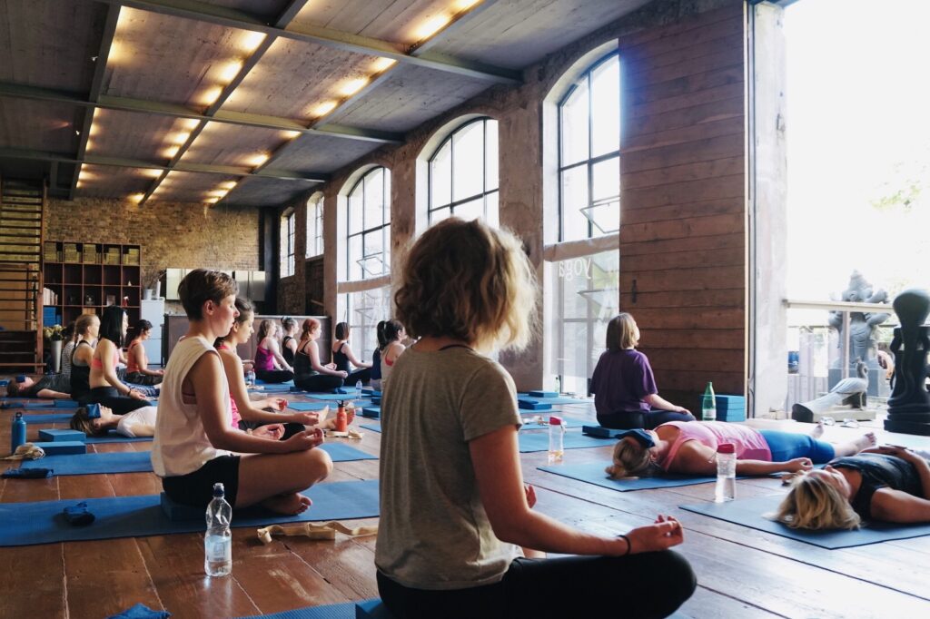 Yoga class in industrial studio