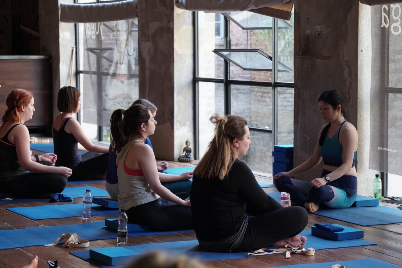 Group women yoga circle meditation